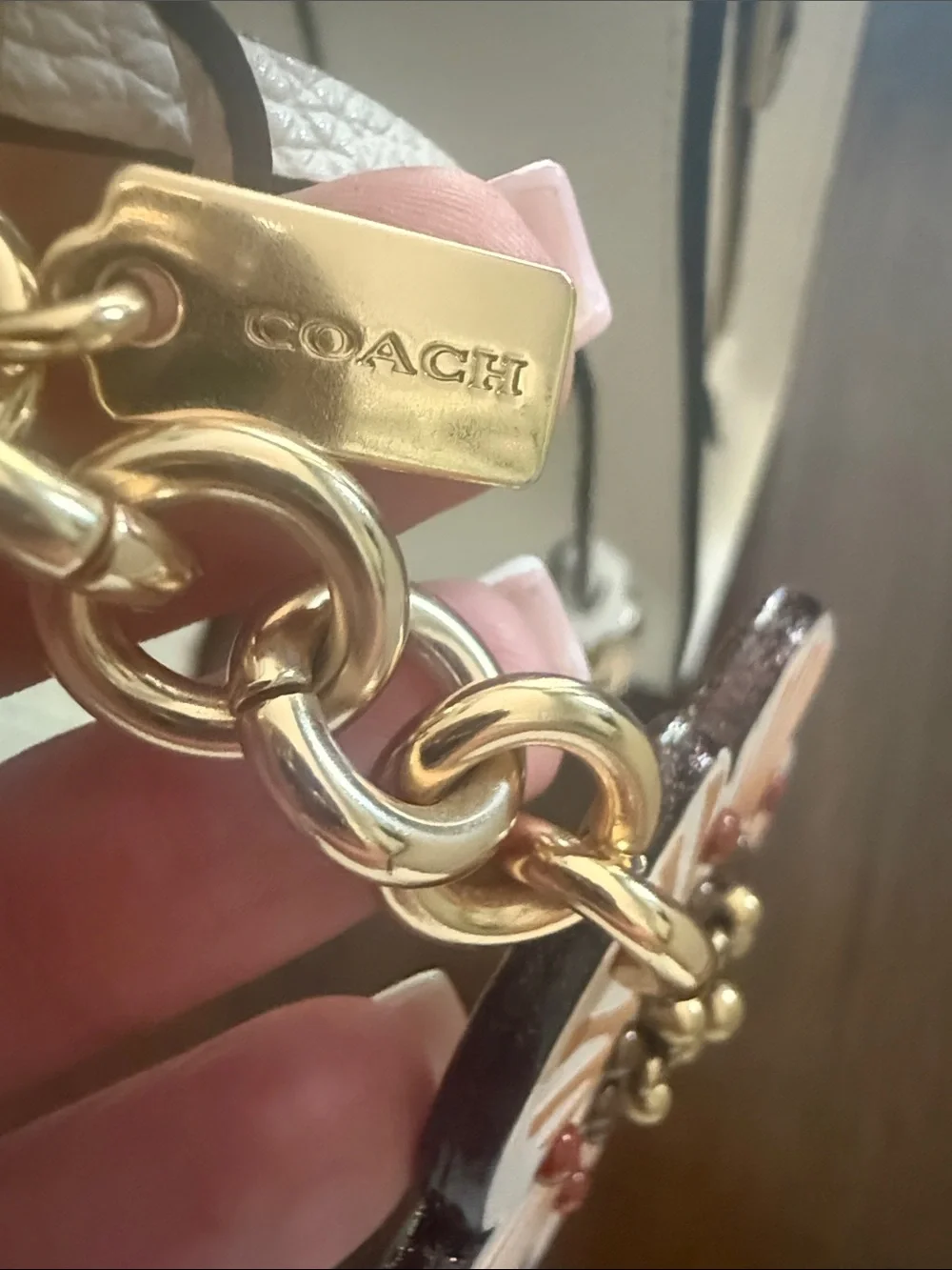 Coach White Pebbled Leather Satchel with Floral Charm